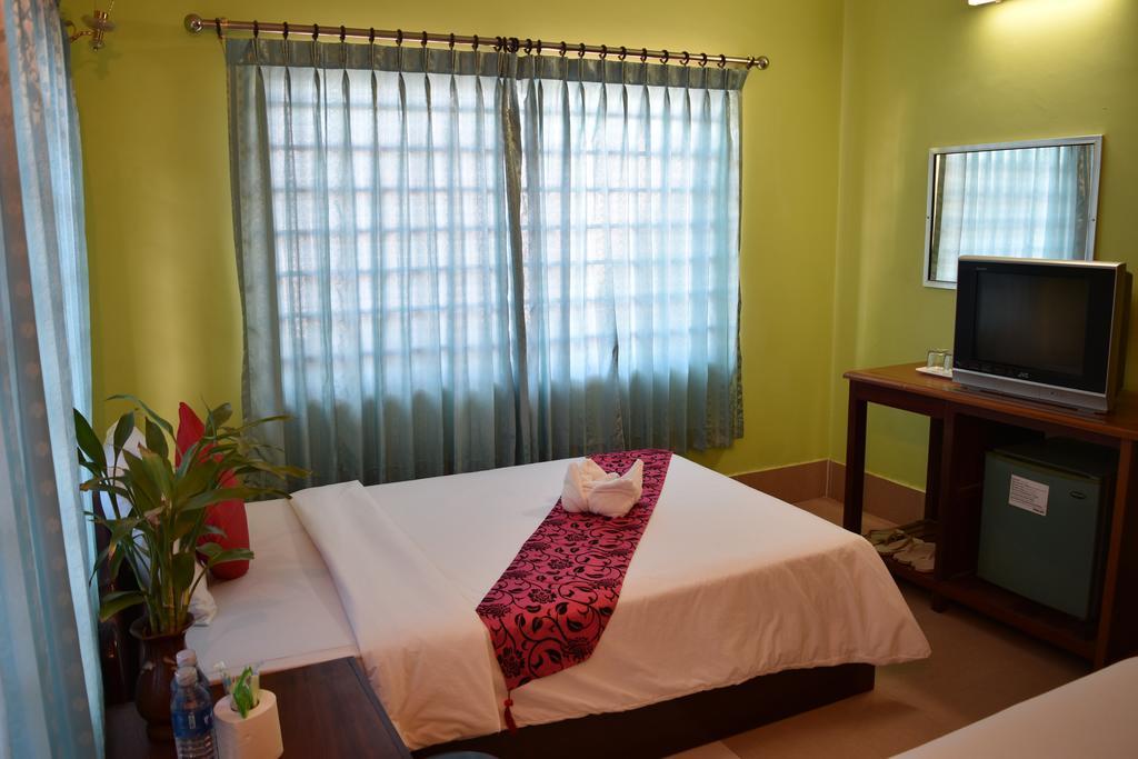 Ta Som Guesthouse & Tour Services Сиемрип Номер фото